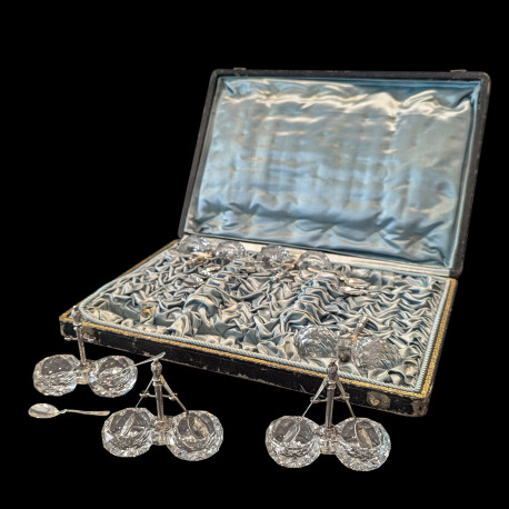 Set of six double salt cellars with their silver spoons, made in Paris around 1900
